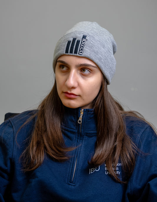 International Business University Cozy Knit Toque offering warmth from our merch apparel collection.